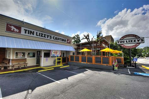 Tin lizzys - Come visit your neighborhood Tin Lizzy’s for a good time. Open for dine-in, curbside pick up, and delivery. Our outdoor patios are open year-round. Book Your Table. Order Ahead. Plan an Event. Order …